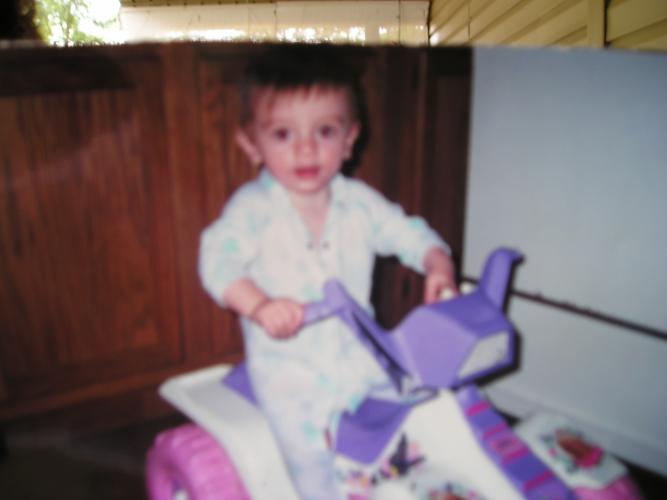 joshie rideing his big wheel 2001